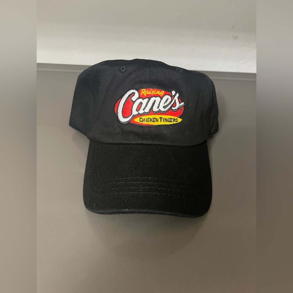 Brand new Raising Cane's Hat Chicken Fingers 
-Black One Love Strapback